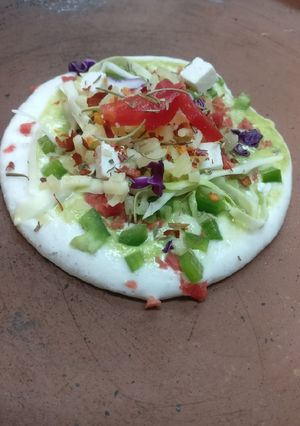 A picture of Double coated paneer & veggies uttapam.