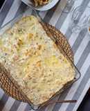 Lasaña de cebolla caramelizada y peras (pasta fresca casera)