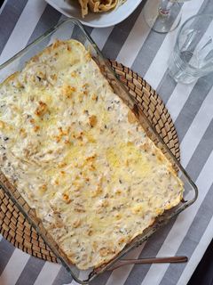 Una foto de Lasaña de cebolla caramelizada y peras (pasta fresca casera)