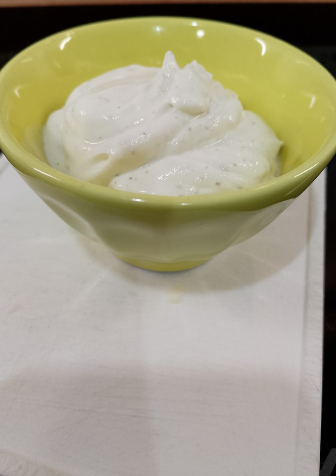 Una foto de Mousse de queso y ajo a las finas hierbas