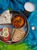 Gujarati Style Bharva Parwal with Besan accompanied with Phulkas