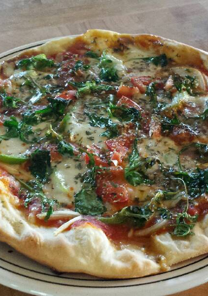 Una foto de Pizzalada