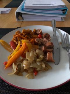 A picture of Chicken sausage and veggies with Cajun-inspired seasoning.