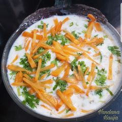 A picture of Tender Drumstick Flowers Seasoned in Yoghurt/  Swanjana De Phool Ka Raita /Swandhro/Suandhray Jo Matho.