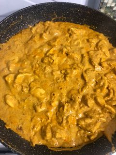 Una foto de Pollo al curry