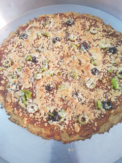 صورة لوصفة بيتزا الزهرة