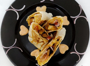 A picture of Peri Peri chicken Tortilla Rolls.