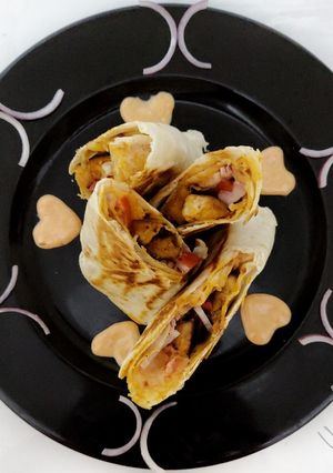A picture of Peri Peri chicken Tortilla Rolls.