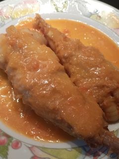 Una foto de Rape en Salsa Americana
