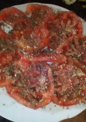 Una foto de Tomates con orégano