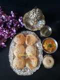Puri, Aloo Posto, and Halwa