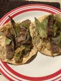 Tacos de nopales y bisteces encebollados