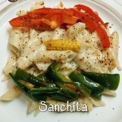 A picture of Creamy Veg Penne Pasta in Tri-colour.