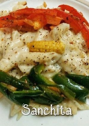 A picture of Creamy Veg Penne Pasta in Tri-colour.