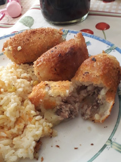 Una foto de Papa rellena