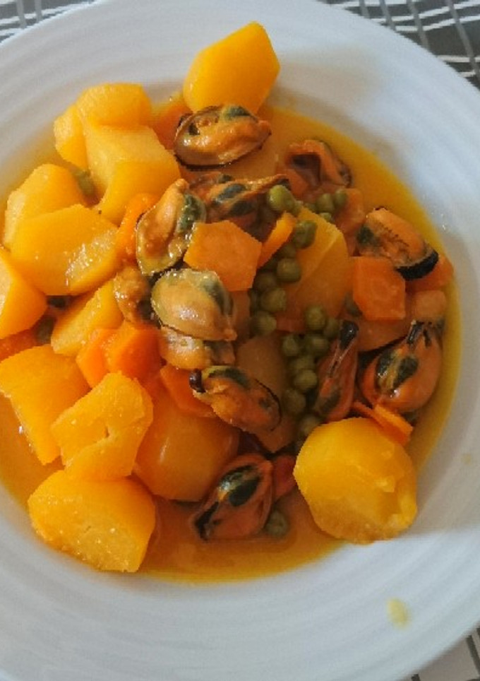 Una foto de Patatas con mejillones