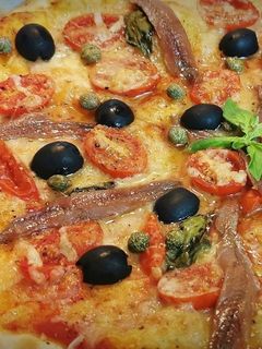 Una foto de Pizza Romana