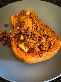 A picture of Baked butternut and spicy mince.