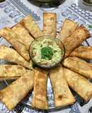 Tequeños de jamón y queso con salsa guacamole