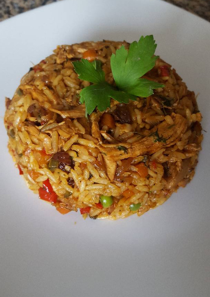 Una foto de Arroz con pollo meloso