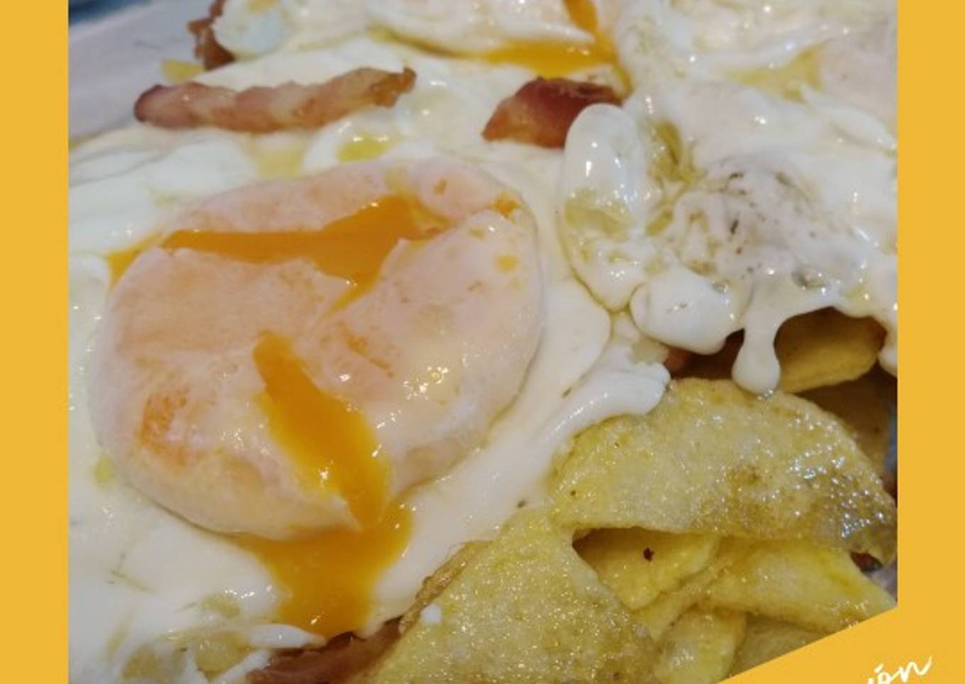 Huevos rotos con jamón