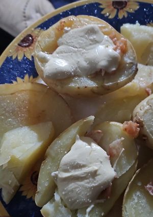 Una foto de Papas Rellenas de Tocino y Queso Oaxaca