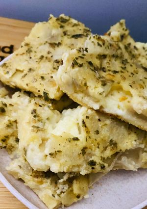 Una foto de Fainá CON CEBOLLA Y QUESO FRESCO 🍕🧅🧀🍕