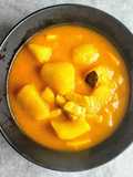 Patatas guisadas con rabas de calamar