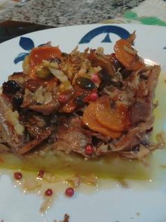 Una foto de Confit de Muslos de Pato a la Naranja