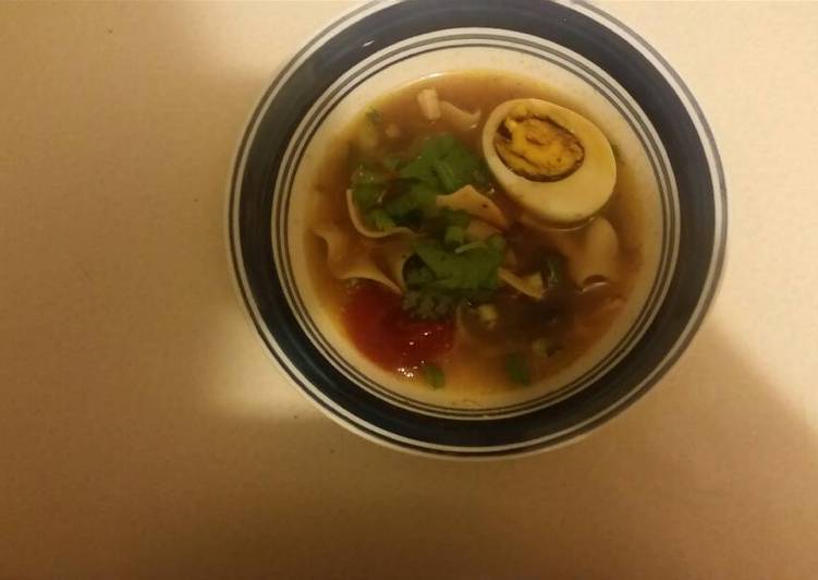 Chicken noodle soup with mushrooms and some extras