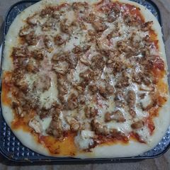 A picture of Chicken Malai Boti Pizza(without oven).