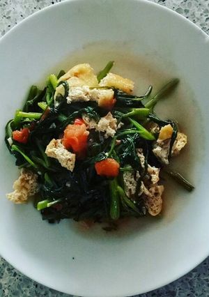 A picture of Water Spinach and Tofu Stir Fry (Oseng Kangkung Tahu).