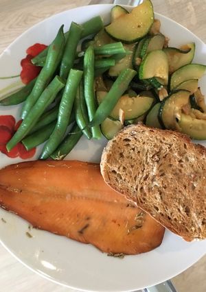 A picture of Smoked Trout with a Butter Garlic Rosemary Marinade.