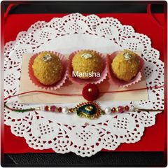 A picture of Orange Coconut Laddu.