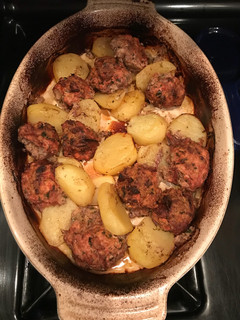 A picture of Meatballs with lemon potatoes.