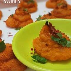 A picture of Baked sweet potatoes swirls.