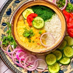 A picture of Matka daal chawal with chattni.