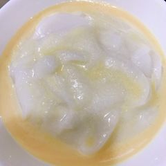 A picture of White pap and milk.