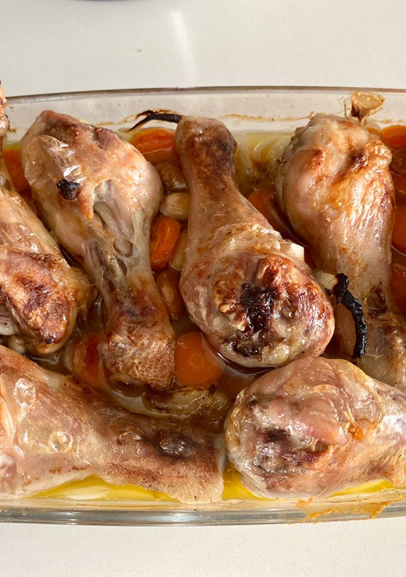 Una foto de Muslos de pollo al horno