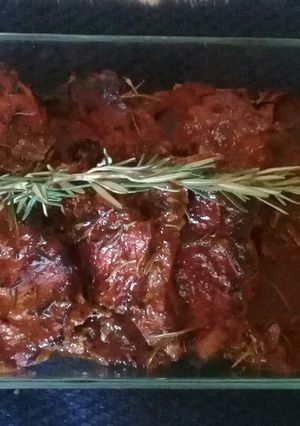 Una foto de Chuletas de cerdo con romero y salsa barbacoa con coca cola
