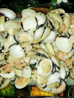 Una foto de Almejas a la marinera con gambas
