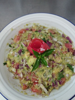 Una foto de Guacamole con culantro