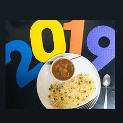 A picture of Chilli Mushroom With Fried Rice.