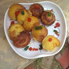 A picture of Rawa cake (in appe pan).