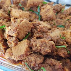 A picture of Beef Rendang (Malaysian-Italian style).