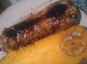 Una foto de zapallo anco a la parrilla