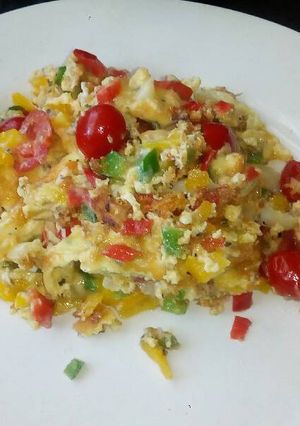 A picture of Messy scrambled eggs.