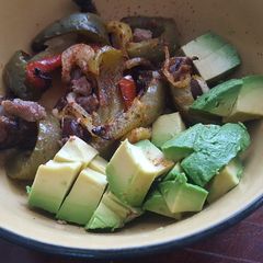 A picture of Steak bowl with chimichurri sauce.