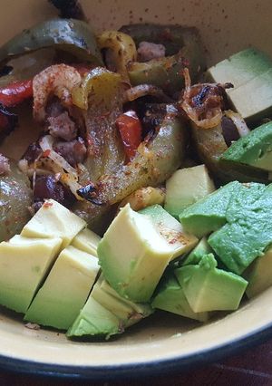 A picture of Steak bowl with chimichurri sauce.
