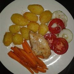 A picture of Chicken Breast with Roasted potatoes.